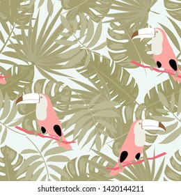Toucan with tropical leaves pattern.Tropical seamless pattern with exotic birds. Hawaiian plants. Botanical background for covers, wallpapers and fabrics.