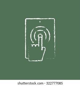 Touch screen lablet hand drawn in chalk on a blackboard vector white icon isolated on a green background.