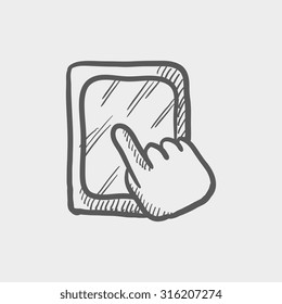 Touchscreen tablet sketch icon for web, mobile and infographics. Hand drawn vector dark grey icon isolated on light grey background.