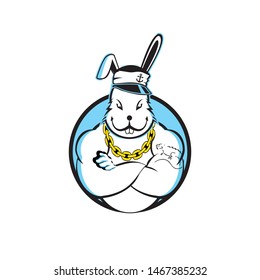 A tough and cool vector mascot featuring a muscular white rabbit dressed as a sailor, complete with a captain's hat and a thick gold chain necklace. The character has a confident expression, folded arms, and a lizard tattoo on his bicep, set within a light blue circular frame. This edgy and fun illustration is perfect for gym branding, streetwear apparel, sports team mascots, barber shops, and lifestyle brands seeking a bold and rebellious character identity.
