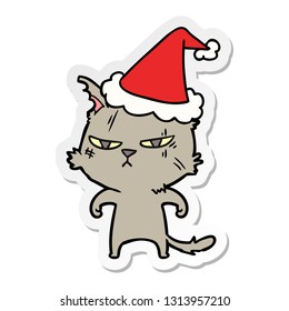 tough hand drawn sticker cartoon of a cat wearing santa hat