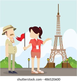 tour guide explaning eifle tower to tourist