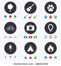 Tourism, camping icons. Fishing, fire and bike signs. Guitar music, photo camera and paw with clutches. Flat circle buttons with icons.