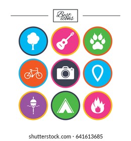 Tourism, camping icons. Fishing, fire and bike signs. Guitar music, photo camera and paw with clutches. Classic simple flat icons. Vector