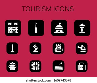 tourism icon set. 12 filled tourism icons. Included Notre dame, Monas, Pagoda, Hook, Pharaoh, Ski, Tent, Backpack, Sea, Space needle, Helicopter, Sport bag icons
