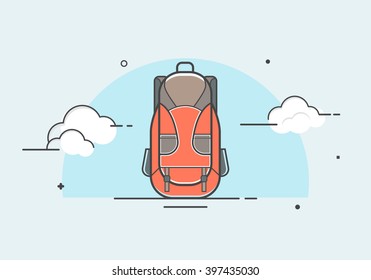 Tourist backpack standing on the background of the cloudy sky.