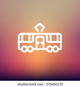 Tourist bus icon thin line for web and mobile, modern minimalistic flat design. Vector white icon on gradient mesh background.