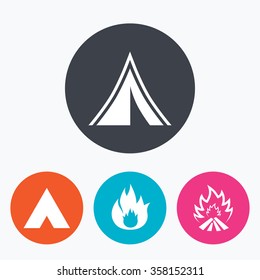 Tourist camping tent icons. Fire flame sign symbols. Circle flat buttons with icon.