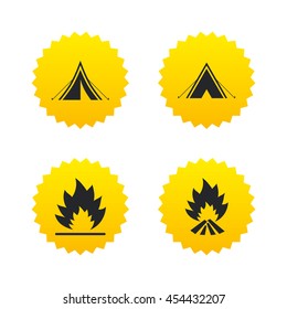 Tourist camping tent icons. Fire flame sign symbols. Yellow stars labels with flat icons. Vector