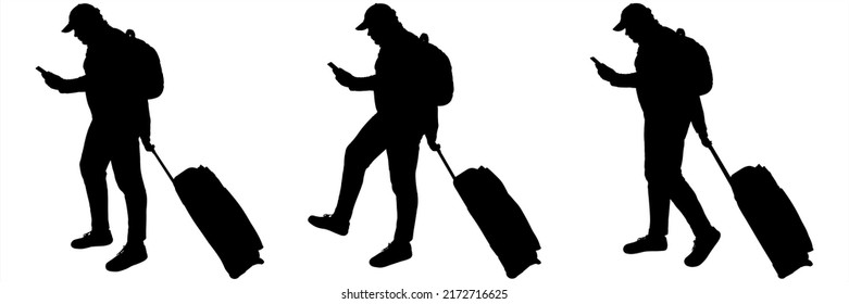 A tourist in a cap with a backpack on his back, luggage on wheels in his hand. A guy with a mobile phone in his hand looks at the screen while walking. Three black male silhouettes isolated on white 