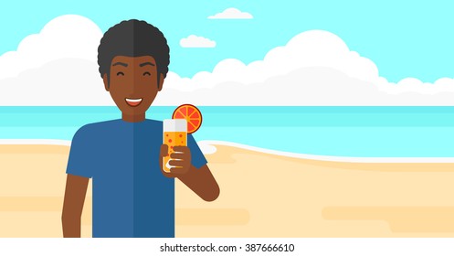 Tourist with cocktail on the beach.