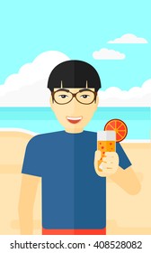 Tourist with cocktail on the beach.