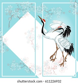 Tourist, greeting or souvenir card in the Japanese style with a pair of cranes and cherry blossoms. Gentle blue background. A frame for text. Vector illustration.