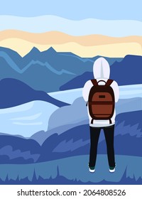 Tourist man with backpack looking on the mountain. Travel concept of discovering, exploring and observing nature. Hiking, Climbing, Trekking, Walking. Adventure tourism.Sports, outdoor recreation.