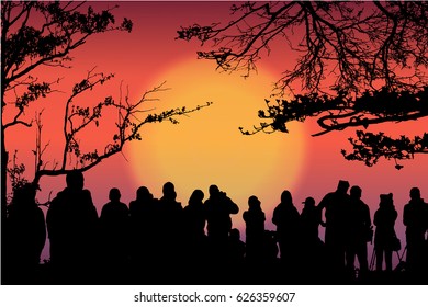 tourist on top of mountain in forest silhouette ,sunrise time.