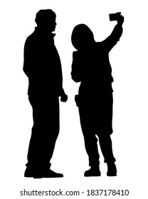 Tourists with smartphones in their hands take pictures of themselves. Isolated silhouettes on white background