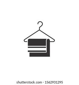 towel in hook of spa silhouette style icon vector illustration design