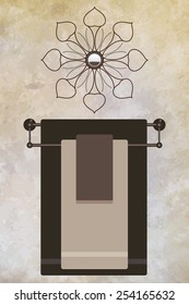 Towel Rack on textured wall in bathroom under decorative wall hanging