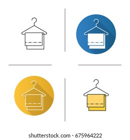 Towels on clothes hanger icon. Flat design, linear and color styles. Isolated vector illustrations