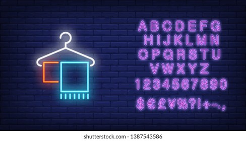 Towels on hanger neon sign. Laundry and housework concept. Advertisement design. Night bright neon sign, colorful billboard, light banner. Vector illustration in neon style.