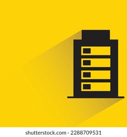 tower building with shadow on yellow background