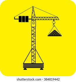 tower crane lifting bricks on  yellow background