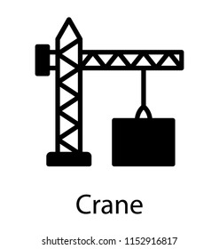 
A tower crane lifting heavy package for delivery, showing cargo process  
