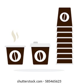Tower of disposable coffee cups and plastic cup with smoke