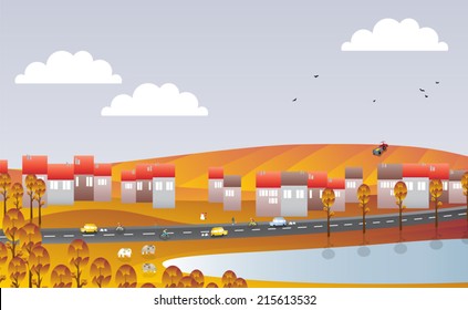 Town by lake and street in the autumn