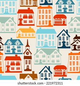 Town seamless pattern with cute colorful houses.