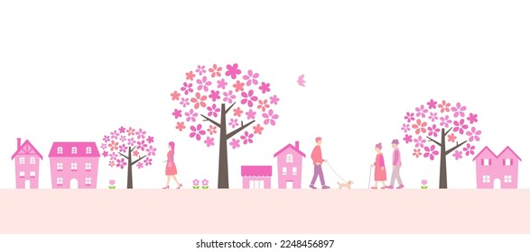 Townscape and people in spring with cherry blossom