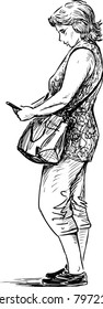 A townswoman with a mobile phone