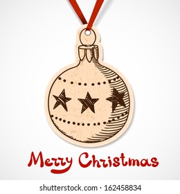 Toy ball paper label on ribbon. Christmas and New Year design element