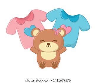 toy bear and baby clothes