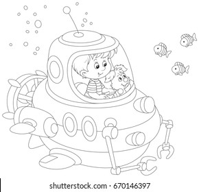 Toy deep-sea bathyscaphe piloting by a little boy with his pup