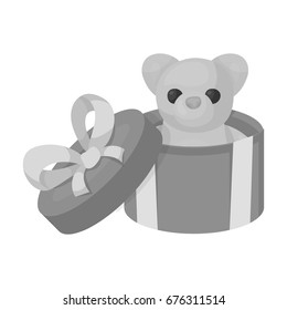 A toy in a gift box. E-commerce single icon in monochrome style vector symbol stock illustration web.
