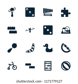 Toy icon. collection of 16 toy filled icons such as beanbag, child bicycle, child building kit, boomerang, dice, beach ball. editable toy icons for web and mobile.
