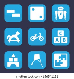 Toy icon. set of 9 filled toy icons such as abc cube, child bicycle, dice, puzzle, kite, robot