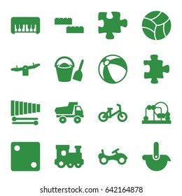 Toy icons set. set of 16 toy filled icons such as bike, child bicycle, puzzle, beach ball, swing, dice, xylophone, bucket and shovel, robot