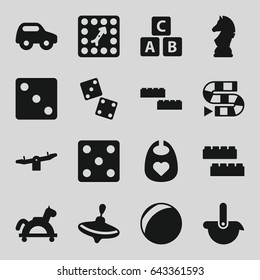 Toy icons set. set of 16 toy filled icons such as abc cube, whirligig, baby bid, child building kit, swing, dice, board game, chess horse, robot, dice, dice game
