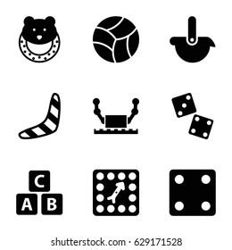 Toy icons set. set of 9 toy filled icons such as ABC cube, boomerang, baby toy, Dice, board game, beach ball, robot