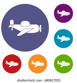 Toy plane icons set in flat circle red, blue and green color for web