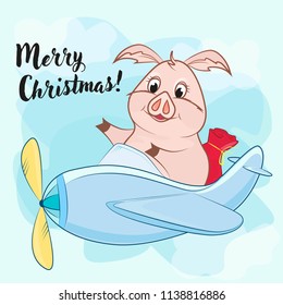 toy plane with a propeller and a pig and a bag, the inscription merry Christmas in the blue sky