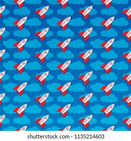 toy rockets seamless pattern on clouds background. cartoon pattern