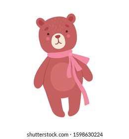 Toy teddy bear with a pink ribbon holiday gift. Isolated on white background.