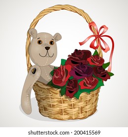 toy Teddy-bear in a wicker basket roses