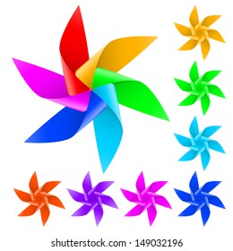 Toy windmill propeller with multicolored blades on a white background
