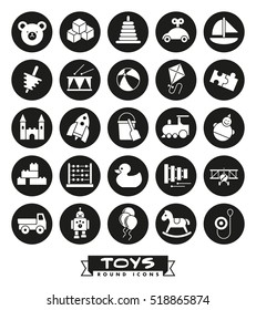 Toys for babies, kids, children and toddlers vector icon set. Collection of round children's toys icons, negative in black circles.