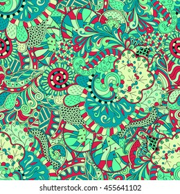 Tracery seamless calming pattern. Mehendi design. Ethnic colorful green doodle texture. Indifferent discreet. Curved doodling mehndi motif. Vector.
