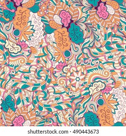 Tracery seamless calming pattern. Mehndi design. Ethnic colorful doodle texture. Curved doodling background. Vector.